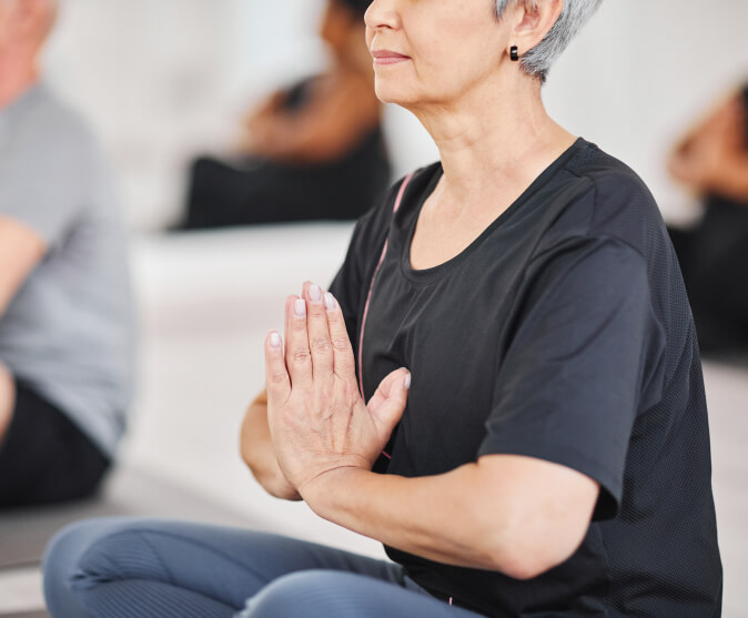 Senior woman doing yoga poses
